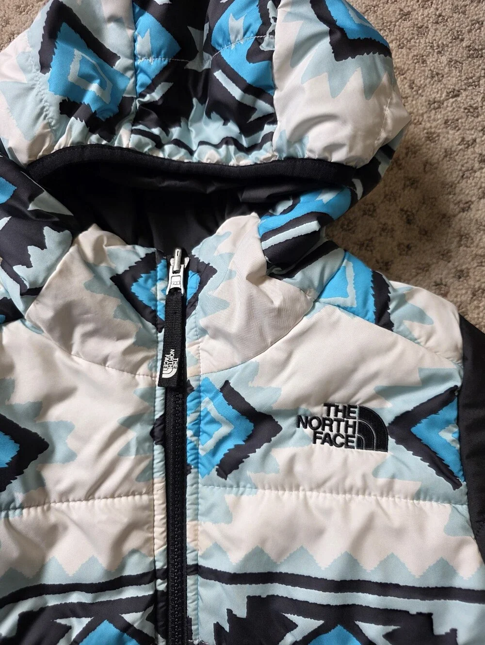The North Face Girls' Reversible Blue Patterned And Black Puffer Jacket
